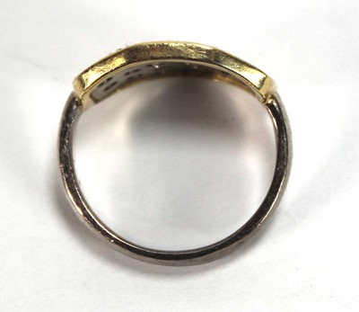 Lot 577 - An 18ct two-colour gold ring pave set eighteen...