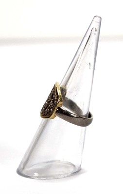 Lot 577 - An 18ct two-colour gold ring pave set eighteen...