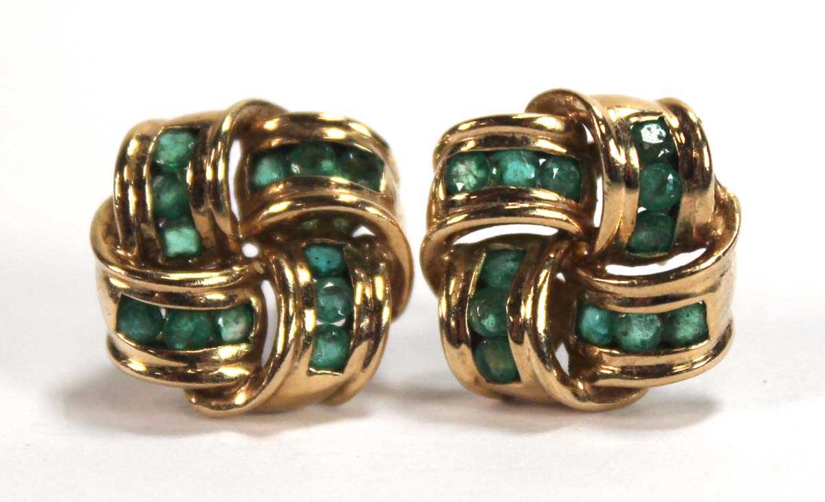 Lot 578 - A pair of 9ct yellow gold ear studs of knot...