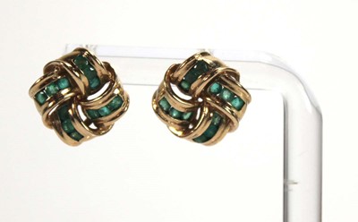 Lot 578 - A pair of 9ct yellow gold ear studs of knot...