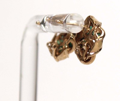 Lot 578 - A pair of 9ct yellow gold ear studs of knot...
