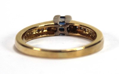Lot 580 - An 18ct yellow gold ring set a square cut...