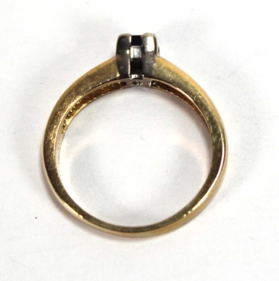 Lot 580 - An 18ct yellow gold ring set a square cut...