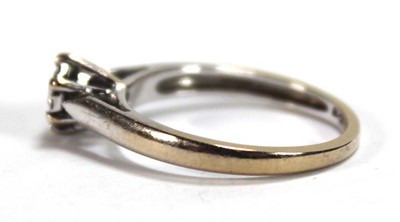 Lot 581 - An 18ct white gold cluster ring set seven...