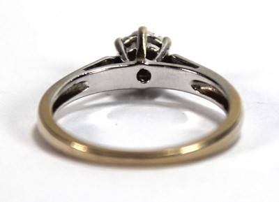 Lot 581 - An 18ct white gold cluster ring set seven...