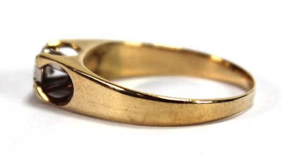 Lot 582 - An 18ct yellow gold ring set small diamond in...