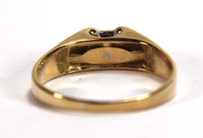 Lot 582 - An 18ct yellow gold ring set small diamond in...