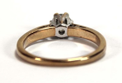 Lot 584 - A 9ct yellow gold ring set brilliant cut...