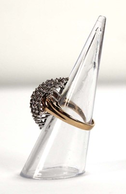 Lot 586 - A 9ct yellow gold ring set small diamonds in a...