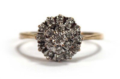 Lot 587 - A 9ct yellow gold three tier cluster ring set...