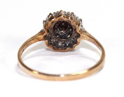 Lot 587 - A 9ct yellow gold three tier cluster ring set...