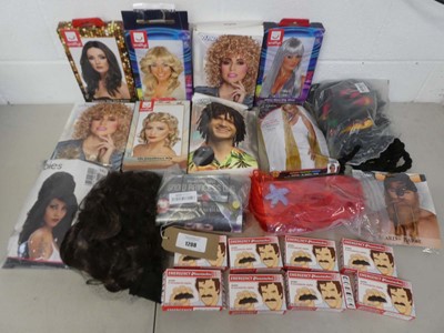 Lot 1208 - An assortment of fancy dress wigs, beard and...