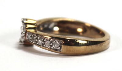 Lot 590 - A 9ct yellow gold cluster ring set seven small...