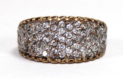 Lot 597 - A 9ct yellow gold ring pave set paste,...