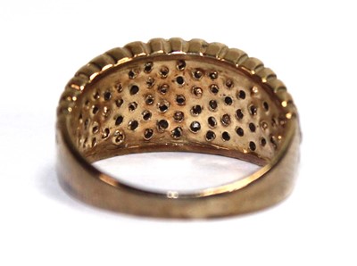 Lot 597 - A 9ct yellow gold ring pave set paste,...