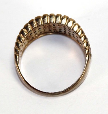 Lot 597 - A 9ct yellow gold ring pave set paste,...