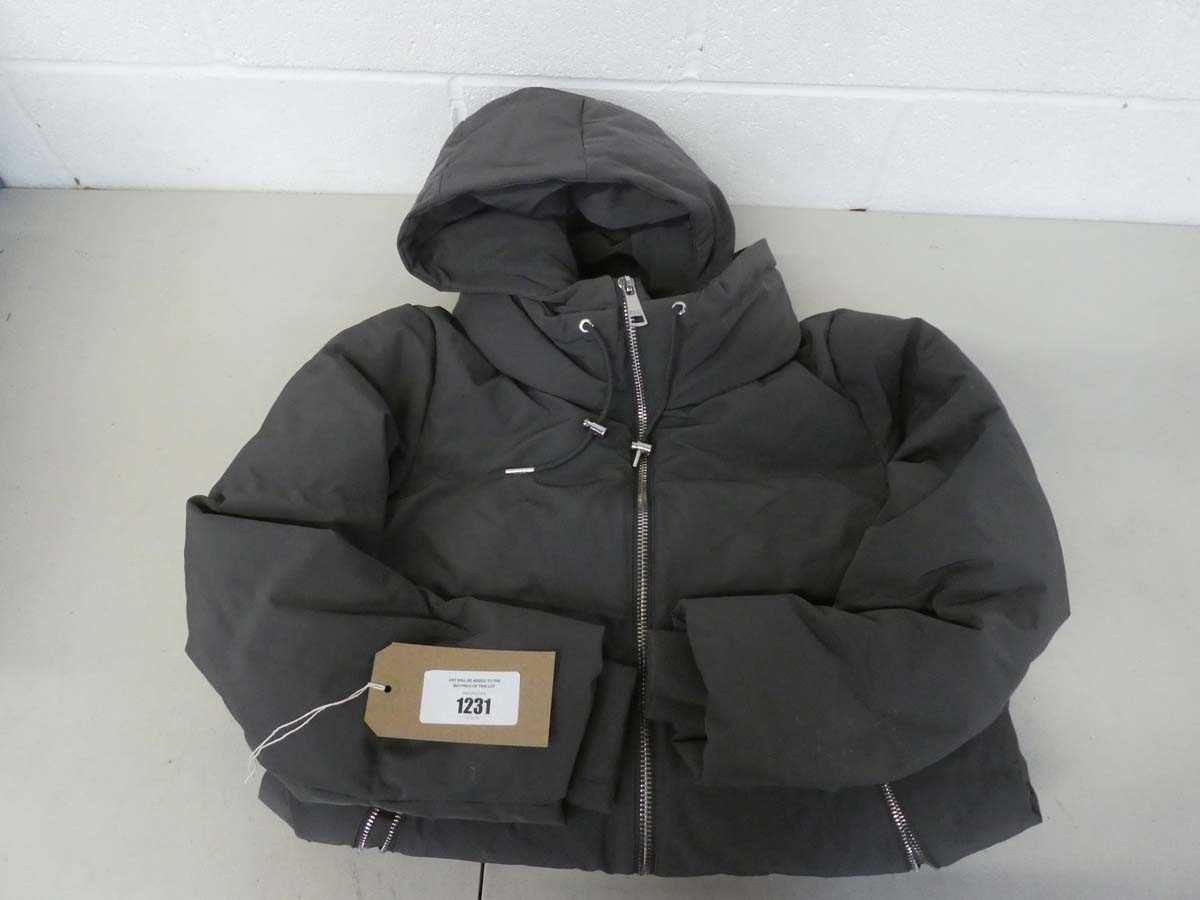 Lot 1231 - Long DKNY hooded puffa coat in grey size medium