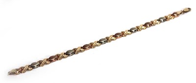 Lot 603 - A 9ct tri-colour gold fancy link bracelet with...