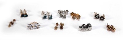 Lot 609 - A pair of 9ct white gold ear studs set small...