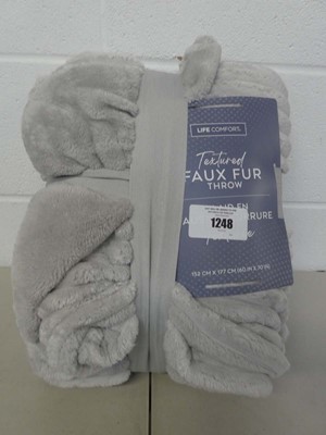 Lot 1248 - Life comfort textured faux fur throw in grey...