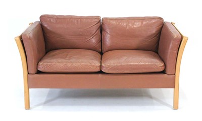 Lot 6 - A Danish brown leather upholstered two seater...