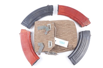Lot 1054 - 4 x AK magazines in canvas pouch (DDR?)