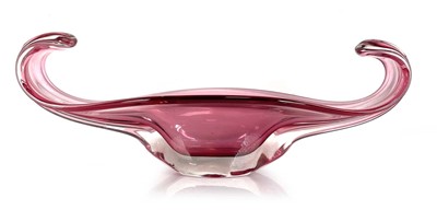 Lot 91 - A cased-glass table centre in pink, in the...