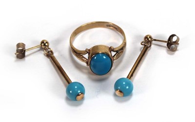 Lot 625 - A 9ct yellow gold ring set cabochon turquoise,...