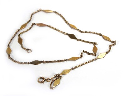 Lot 635 - A yellow metal necklace with diamond shaped...