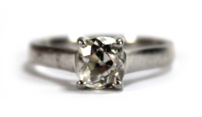Lot 637 - A platinum ring set old cushion cut diamond in...