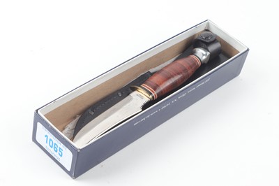 Lot 1065 - Ka-Bar sheath knife, with 5½ ins blade, ringed...