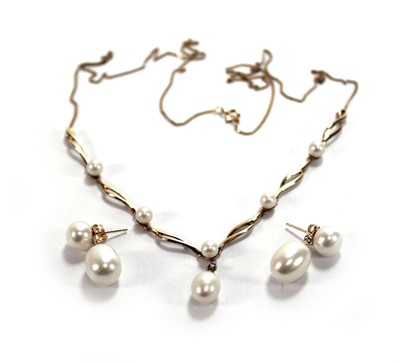 Lot 639 - A 9ct yellow gold fine curblink necklace...