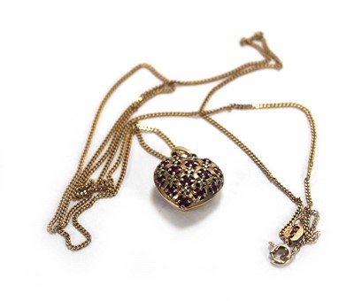 Lot 642 - A 9ct yellow gold fine flat curblink necklace...