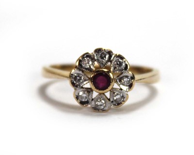 Lot 644 - An 18ct yellow gold cluster ring set small...