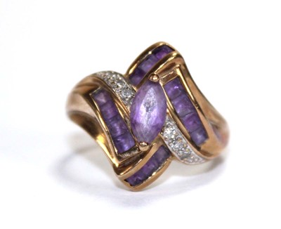 Lot 660 - A 9ct yellow gold ring set pale amethyst and...