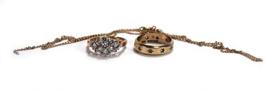 Lot 664 - A 9ct yellow gold dress ring set paste,...