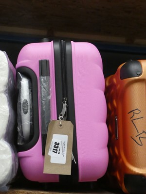 Lot 3317 - Pink 4 wheel hard shell combination lock suitcase
