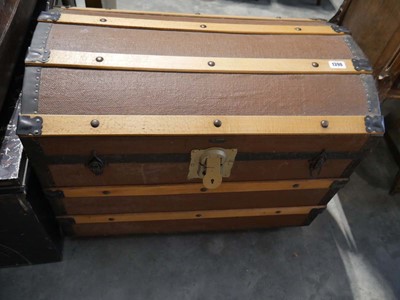 Lot 1390 - Twin handled wooden banded travel trunk in brown