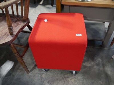 Lot 1394 - Red upholstered mobile stool