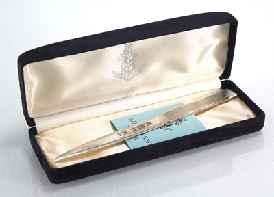 Lot 309 - A silver letter opener with engine turned...