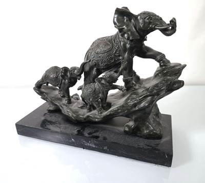 Lot 154 - A bronze sculpture modelled as three Indian...