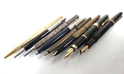 Lot 159 - A group of pens including a cased Parker with...