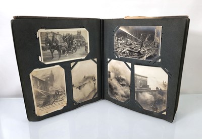 Lot 161 - An album of postcards mainly relating to fire...