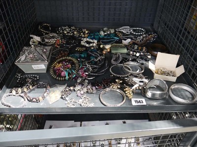 Lot 1543 - Cage of costume jewellery incl. bangles, beads,...