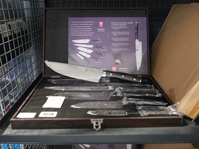 Lot 1556 - Cased Damascus 5 piece knife set