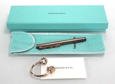 Lot 317 - A Tiffany & Co. silver ballpoint pen, l. 8.5...