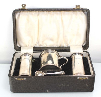 Lot 319 - A silver three piece cruet set of tapered form,...