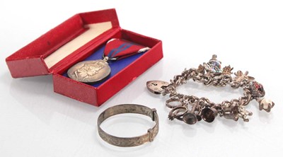 Lot 327 - A silver charm bracelet, an expanding silver...