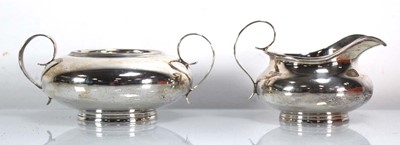 Lot 330 - An early 20th century silver two handled sugar...