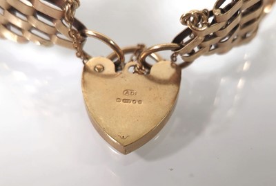 Lot 408 - A 9ct gold seven bar gate bracelet. Approx....
